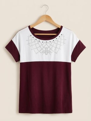 Blusa bicolor com aplicação de pedraria